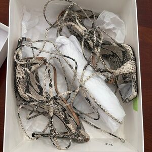 Animal print lace up leather heel